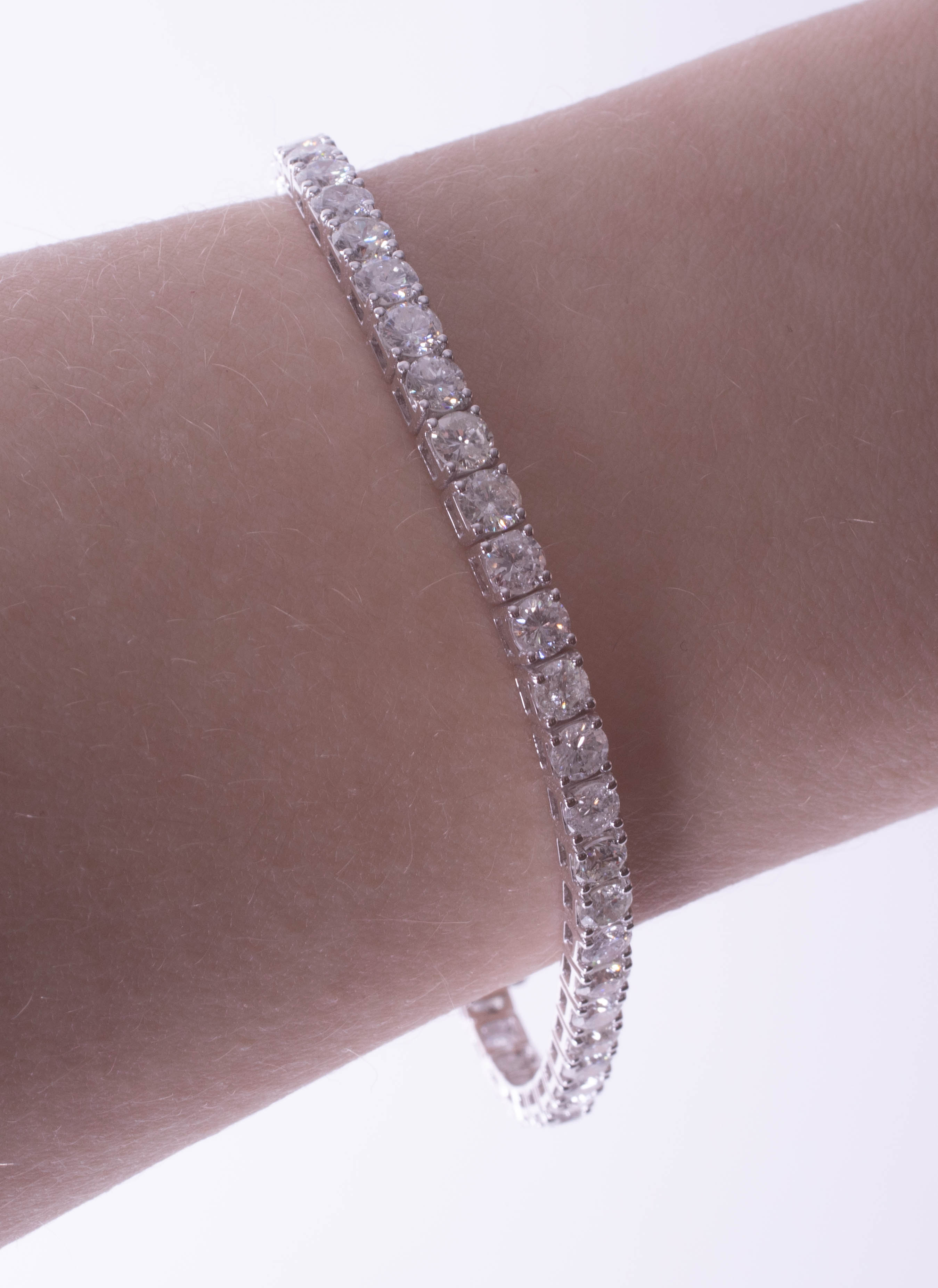 A fine 18ct white gold diamond line bracelet, total diamond weight approximately 8.20ct, set with - Image 4 of 9