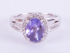 An 18ct white gold diamond and Tanzanite ring approx. 2.75ct, ring size N.