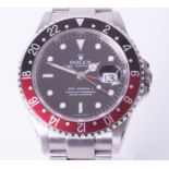 Rolex, a gents 2006 GMT Master II, Model 16710, black and red (coca cola) bezel, stainless steel,