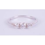 An 18ct white gold trilogy ring, approx. 0.50ct, estimated colour E, clarity SI1, ring size M.