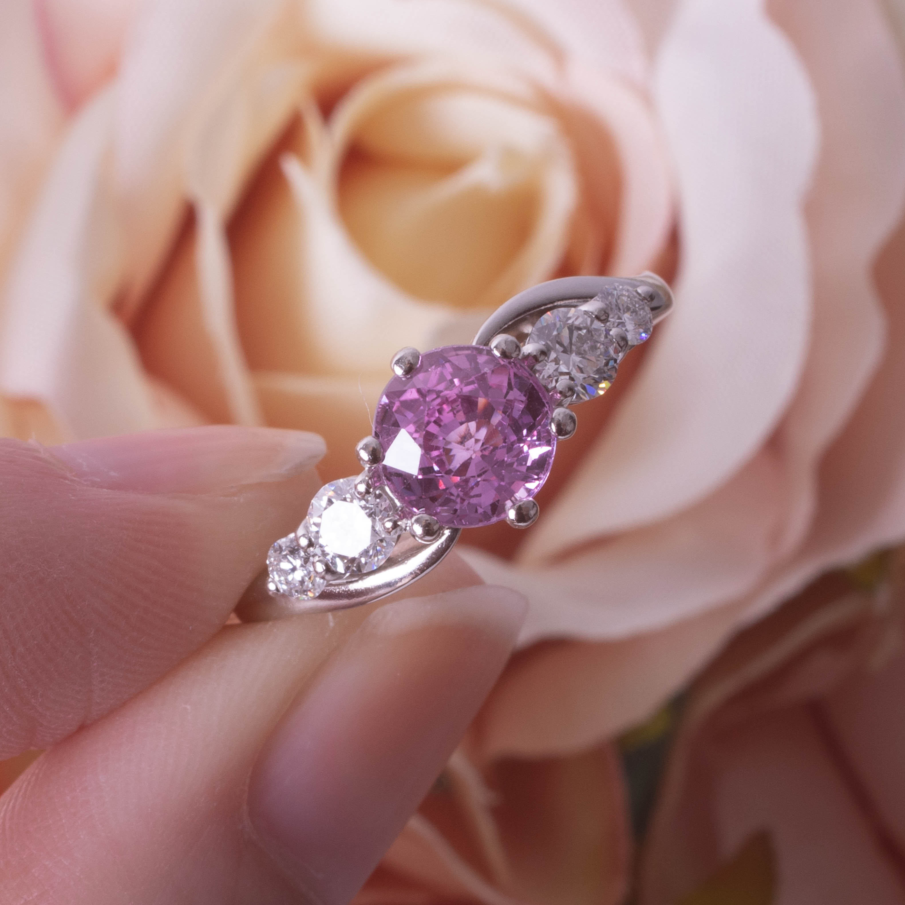 A platinum diamond and pink sapphire ring, size N. - Image 3 of 3