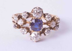 An Edwardian sapphire and diamond 13 stone ring, size K.