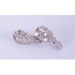 A pair white gold Art Deco style clip on earrings of leaf design.
