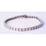 A fine 18ct white gold and diamond set line bracelet, diamond weight approx. 4.00 carats.