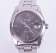 Rolex, a gents stainless steel Oyster Date wristwatch with grey dial and baton numerals, the dial