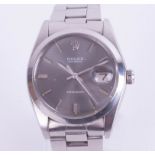 Rolex, a gents stainless steel Oyster Date wristwatch with grey dial and baton numerals, the dial