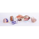 A collection of six Royal Crown Derby paperweights including Snail, Snake, Walrus etc (one with