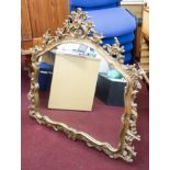 A reproduction gilt framed mantle mirror.