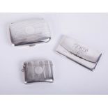 A silver stamp cigarette/cigarette case with monogram marked June 1907, together with a silver and