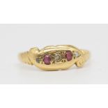 An 18ct small ruby and diamond set antique ring.