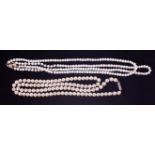 Two freshwater pearl necklaces, each approximately 46cm and a faux pearl necklace (3).