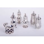 Two silver pairs of pepper pots, another and a lidded mustard pot in silver, total weight