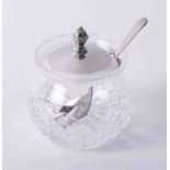 Silver plated lidded crystal jam pot/sugar bowl with separate spoon.