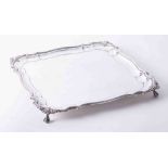 Large square silver plated salver in good condition, plain body with bead decoration and shell