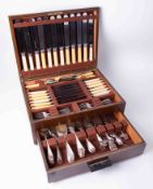 A boxed canteen of plated cutlery.