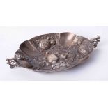 A silver embossed small fruit dish, width 17cm.