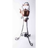 Copper kettle on wrought iron stand, height 80cm.