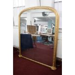 A Victorian gilt framed over mantle mirror, height 161cm, width (max) 143cm.
