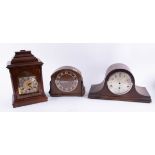 A 20th century mahogany bracket clock (partly built) together with four other assorted mantle