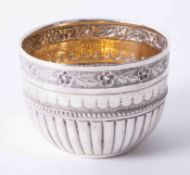 Solid silver Victorian bowl with silver gilt inner, foliate embossed and engraved decoration to