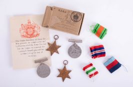 A group of four WWII medals with original OHMS box, awarded to REJ Rickard, Plymouth, complete