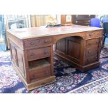 A 19th century mahogany Partners Desk, in three sections, one drawer missing, width 143cm, height