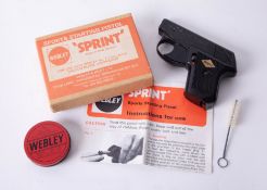 A Sports starting pistol by Webley 'Sprint' boxed together with pellets.