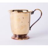 A silver gilt christening beaker with looped handle, stamped .925, Sheffield maker R.C., height 7.