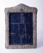 Antique Georgian silver fronted picture frame with heavily embossed scroll & flower decoration, blue