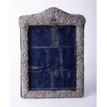 Antique Georgian silver fronted picture frame with heavily embossed scroll & flower decoration, blue