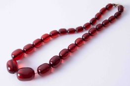 Antique single row ruby red amber necklace strung on wild silk with yellow gold bolt ring clasp,