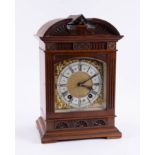 An early 20th Century bracket clock with eight day movement, striking on a gong, height 33cm.