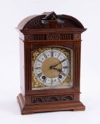 An early 20th Century bracket clock with eight day movement, striking on a gong, height 33cm.