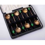 Cased set of six Art Deco gold plated cocktail spoons, with shell bowl and olive stems, each spoon