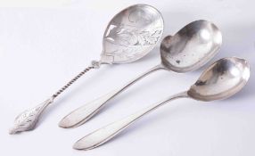 Three Dutch silver spoons (2 matching servers and 1 fancy pierced fruit server with twisted stem)