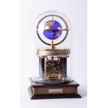 A Franklin Mint National Geographic Society Millenium clock, eight-day movement, glass dome, 32cm