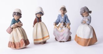 Lladro, four figures in brown pottery of Dutch girls, height 12cm.