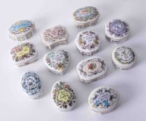 A collection of twelve Franklin Mint porcelain musical boxes.
