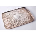 Victorian Sheffield silver dressing table tray with embossed decoration showing putti, a female