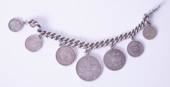 An Antique coin bracelet set with six coins including Victorian gothic florin, a 1787 George III