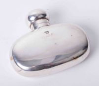 A small silver hip flask, height 7.50cm.