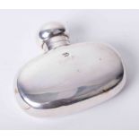 A small silver hip flask, height 7.50cm.