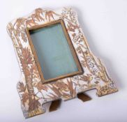 A three colour photo frame, height 17cm.