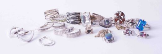 A bag of various silver and other rings, costume jewellery, pendants, etc.