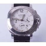 A replica fashion watch marked 'Luminor Panerai', cased (watch has faults).