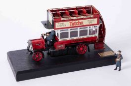 A Bassett Lowke precision scale white metal model of a London Bus, on stand, length 16cm, 36/2000