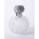 A silver and glass scent bottle, makers mark HTB with gilt lined lid (lacks stopper), height 14cm.
