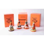 A Wedgwood set of four Clarice Cliff Bizarre conical sugar sifter, from the Clarice Cliff