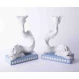 A pair of pale blue Jasperware dolphin candlesticks 2000 with original box and outer box, issued