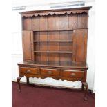 A large antique oak dresser (two sections).